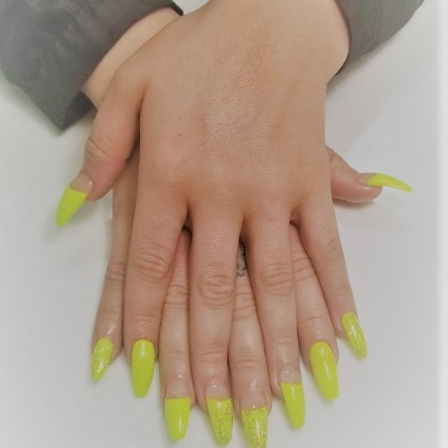 a full set acrylic manicure with neon gel polish